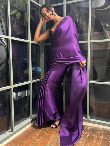 I styled Tripti Dimri in this elegant purple satin saree from Swtantra, paired with a contrasting black sequin blouse. The look is simple, modern, and incredibly chic, proving the power of color and texture.
