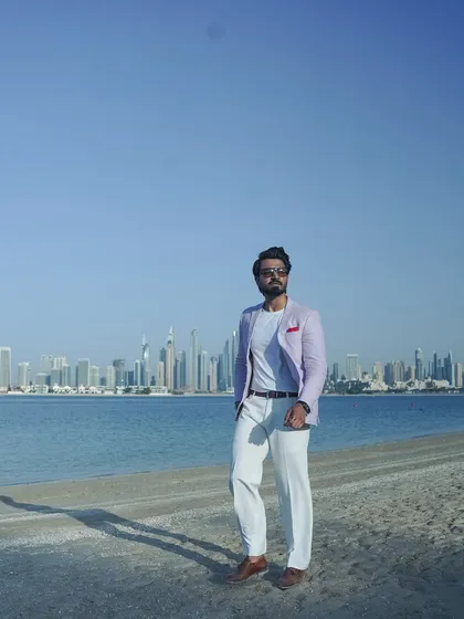 A confident stance against the stunning backdrop of Dubai. I bring this confidence to every event I host.