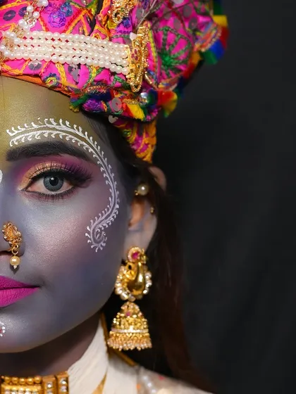 A close-up of the artistic Krishna makeup.