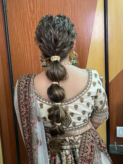 A back view of the stylish bubble ponytail, showing the texture and detail of the hairstyle.