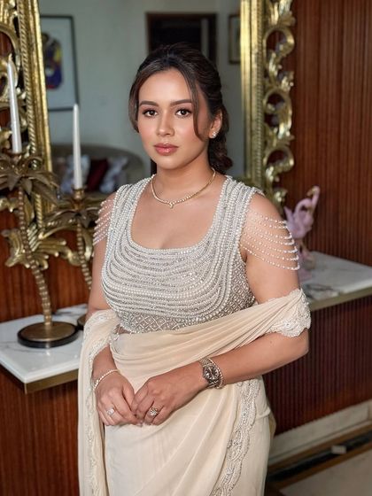 A three-quarter portrait showing the full effect of the elegant ensemble.