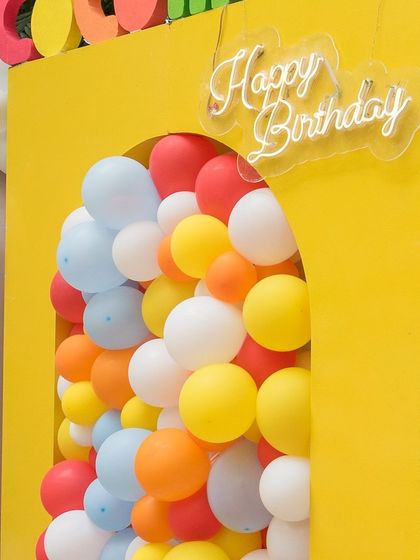 Cocomelon is a fantasy for so many children, so I brought the show's joy and color to life for this first birthday. The setup featured all the beloved characters, a rainbow arch, and a ball pit, creating a delightful and recognizable world for the little guests.