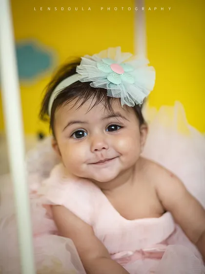 A heart-meltingly sweet and cheeky smile. This close-up from the hot air balloon shoot is pure happiness.