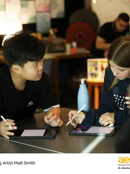 Students work together on a digital drawing, learning from each other's techniques. Our workshops are designed to be interactive and collaborative, reflecting real-world creative environments.