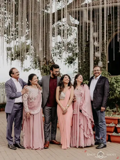 A perfect family portrait. Capturing the whole family together, sharing in the couple's happiness, is an essential part of the story.