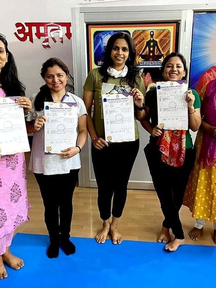 Five more students proudly displaying their certificates. Their commitment to deepening their practice and knowledge is truly commendable.