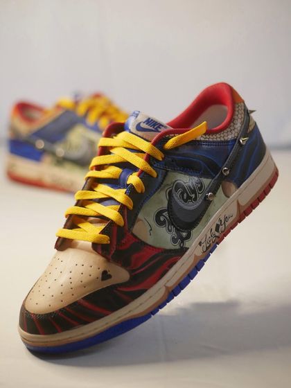 A floating shot of the Harley Quinn custom Dunk, showing off the full design. This was a true labor of love.