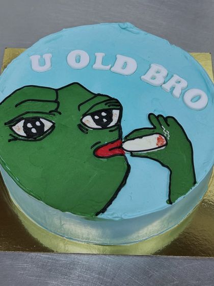The cake requests I get are the best. This one features the classic Pepe the Frog meme with the message "U OLD BRO". It's the perfect way to lovingly roast a friend on their birthday.