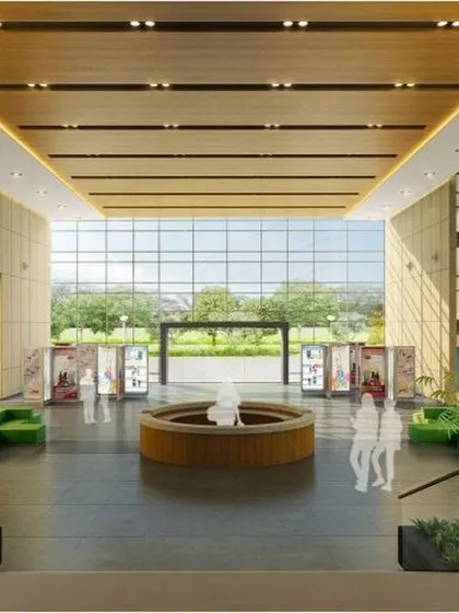 The entrance lobby at Amity University, Mumbai, is designed to be a welcoming and open congregation space. The use of natural materials, indoor plants, and a central seating arrangement creates a calm yet impressive entry point to the campus.