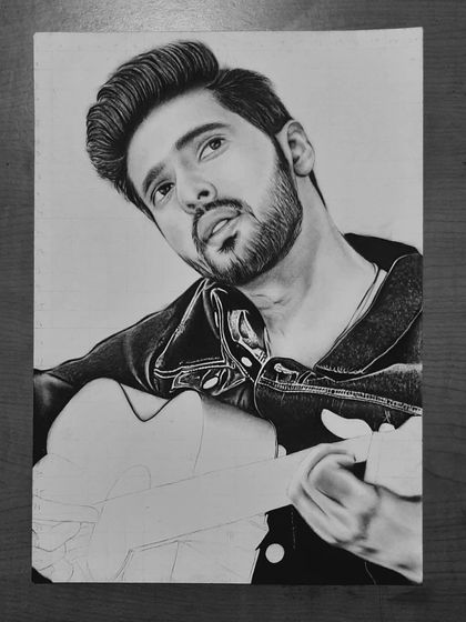 Follow the 90-hour journey of my Armaan Malik portrait. These progress shots show how I use the grid method to ensure accuracy and build up the face, hair, and clothing textures.