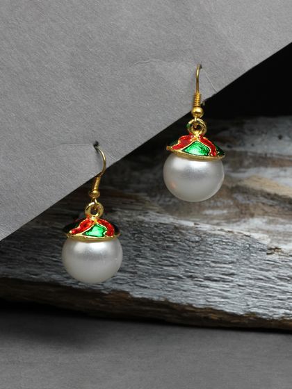 Simple and elegant pearl drop earrings with a touch of meenakari work on the cap.