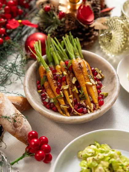 A closer look at our roasted baby carrots with pomegranate and pistachios, a colorful and flavorful addition to the holiday table.