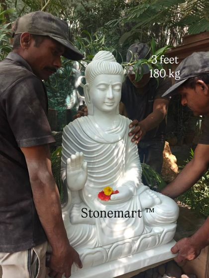 Our team demonstrates the weight and solid construction of the 3-foot marble Buddha as they move it. This piece is built to last for generations.