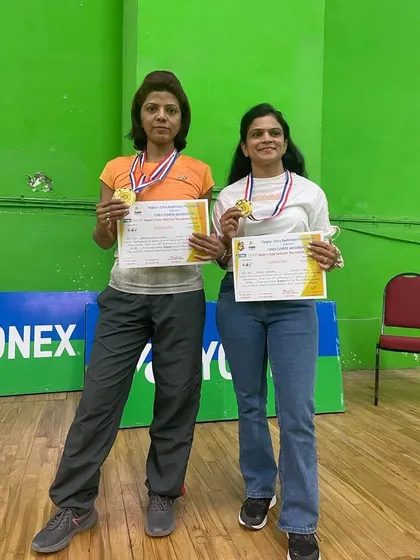 Double the success. Our player Bhagyalaxmi Kulkarni and her partner proudly show off their gold medals from the Palghar Zillha Badminton Foundation Tournament.
