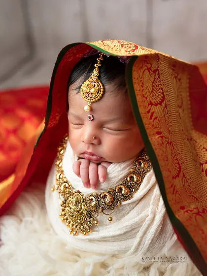 Blending tradition with the tenderness of new life. This portrait, inspired by Varamalakshmi Pooja, was a special request that allowed us to create something truly unique and meaningful, celebrating both heritage and a new beginning.