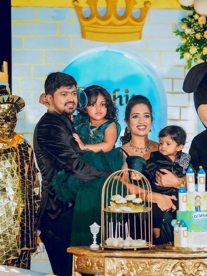 A royal family portrait at Smyra and Dishir's castle-themed birthday celebration.