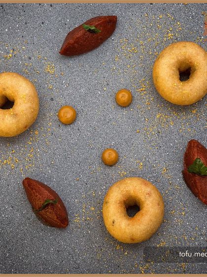 Our inventive take on a South Indian classic. These tofu medu vadai are light, crispy, and served with a flavourful chutney, offering a modern, plant-based version of the original.