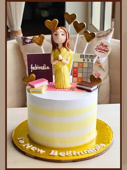 A thoughtful retirement cake with a personalized figure and elements representing a new chapter.