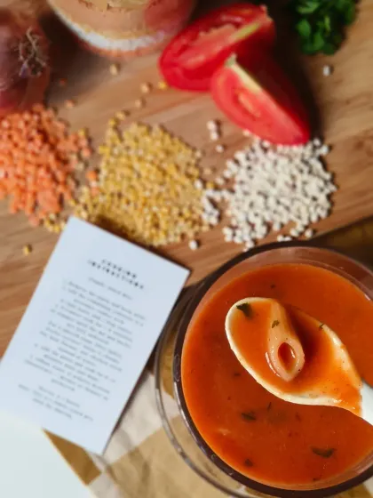 A spoonful of my hearty Lentil and Macaroni Soup. This image shows the comforting texture of the soup, made from the pre-mixed jar that includes lentils, macaroni, and spices for a quick and nourishing meal.
