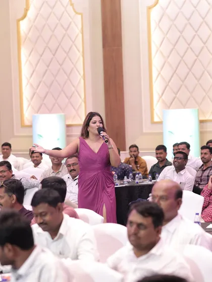 Engaging with the audience at a corporate event for Marcin Crop Care. I can connect with diverse audiences, including those in the agricultural sector.