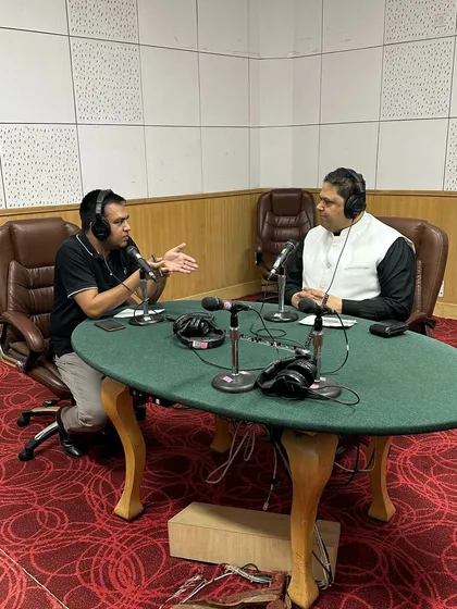 In the All India Radio studio, I engage in a detailed discussion about the complexities of tenancy laws. My goal in these sessions is to educate both landlords and tenants on their legal rights and obligations to prevent and resolve disputes outside of court.