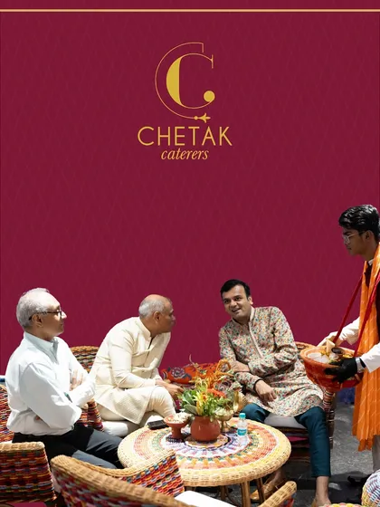 An ode to age-old Indian hospitality. Here, a server in traditional attire offers snacks to guests, showcasing our commitment to crafting beautiful and authentic experiences.