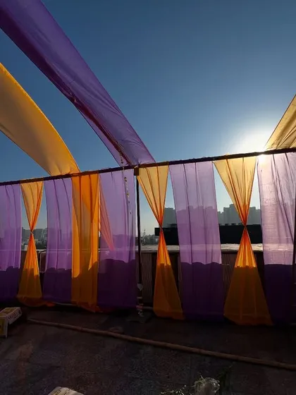 A view of the rooftop draping against the sun, creating a beautiful silhouette effect.