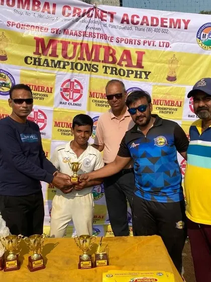 Dinesh Besra recognized as the 'Emerging Player' at the Mumbai Champions Trophy.