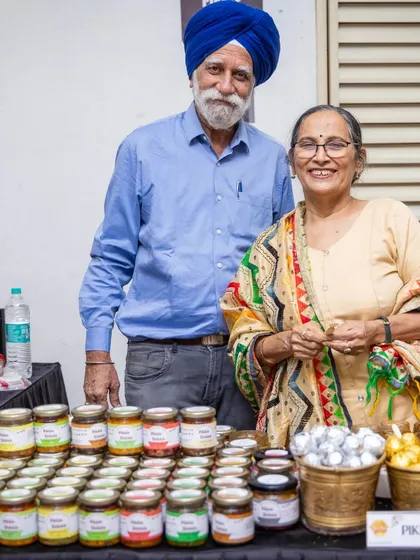 This is my husband Ekbal and me. We run this business together as a team, making sure every jar we sell is perfect. It is a true family business, built on passion and tradition.