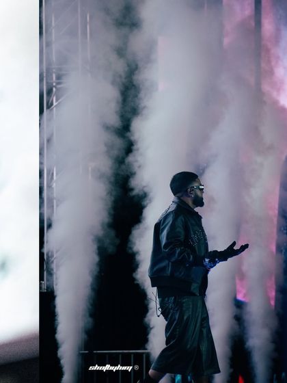 NAV makes his grand entrance through a wall of smoke at Rolling Loud Mumbai. This shot captures the anticipation and drama of an artist taking the stage.