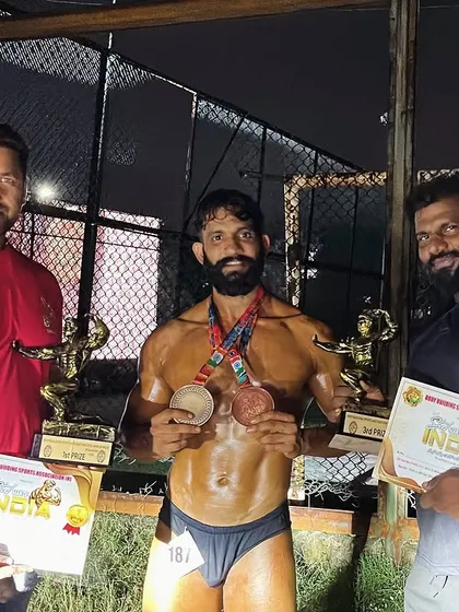Another shot with my double-medal winner. The certificates and trophies are proof of the hard work we put in during the contest prep.