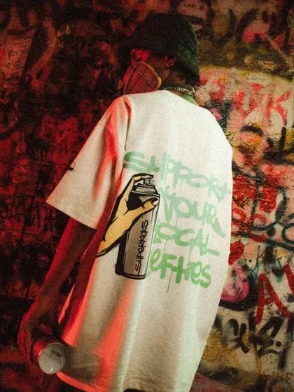 A shot from a collaboration with Superkicks and Lefthander. This photo, taken against a heavily tagged wall, captures the authentic street culture that my art comes from.