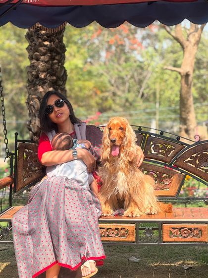Enjoying a sunny day out on a swing with both my babies. This is what motherhood looks like for me.