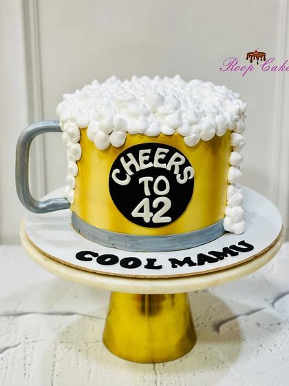 Another round of my popular beer mug cake. This one was made for a "Cool Mamu" turning 42, showing that this fun design is a hit for any celebration.