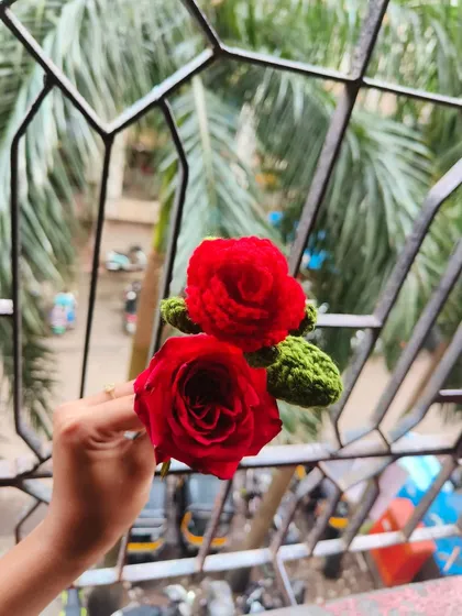 Can you tell which is which? I put my handmade crochet rose right next to a real one to show how much detail goes into each petal. It’s the beauty of a real rose, made eternal.