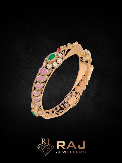 This bangle reflects your inner light with its vibrant design. The piece features a mix of pink and green stones set in an intricate pattern, reflecting the beauty of traditional Indian jewellery.