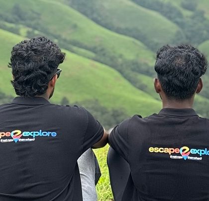 Our trip leaders, your friends on the trail, taking a moment to enjoy the view at Netravati.