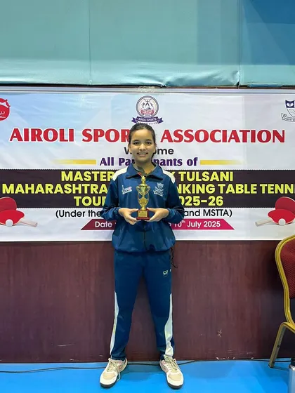Trissha Ludbe holding her trophy after securing a Bronze Medal in the U-15 Girls category at the First Maharashtra State Ranking Tournament.