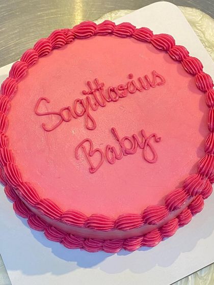 A top-down view of the Sagittarius-themed cake.