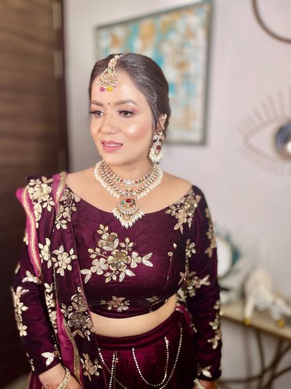 When makeup is on point. A glamorous look for this guest in a rich velvet lehenga.