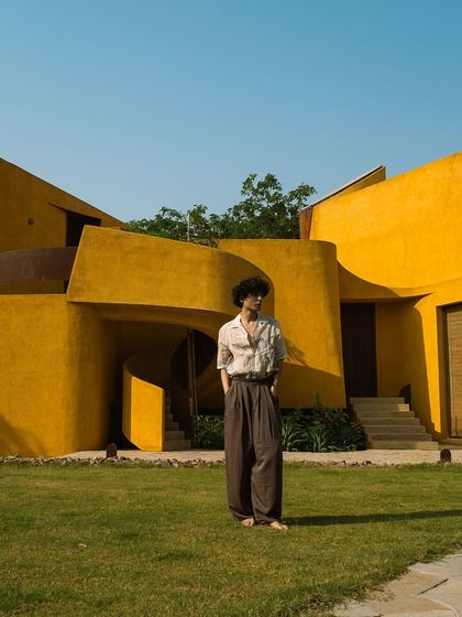 A guest enjoys the morning sun on the lawn in front of our main building. This image captures the sense of freedom and peace that our space provides.