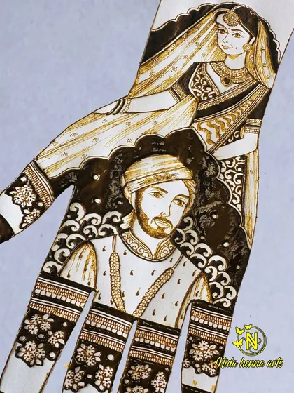 A detailed couple portrait on paper, showing the shading and layering techniques we practice in class. This is how we build the confidence to work on a client's hands.