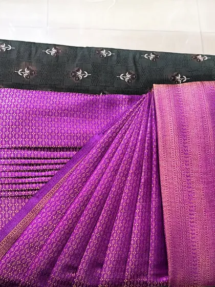 This is the final result of my pre-pleating service on a beautiful purple silk saree. I make sure every pleat is perfectly set and ironed, giving you a crisp and neat look.