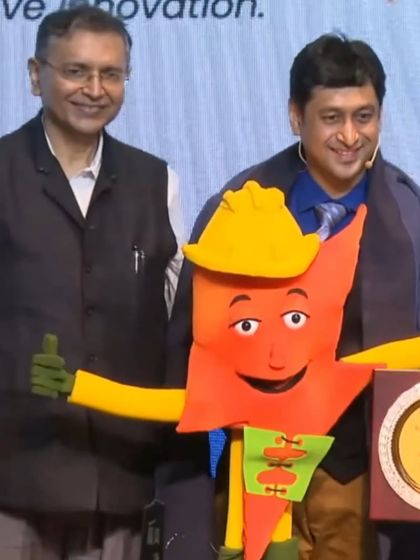 Receiving an award with the Suraksha Shakti puppet. Using puppetry for public service announcements is an effective way to capture attention and deliver an important message.
