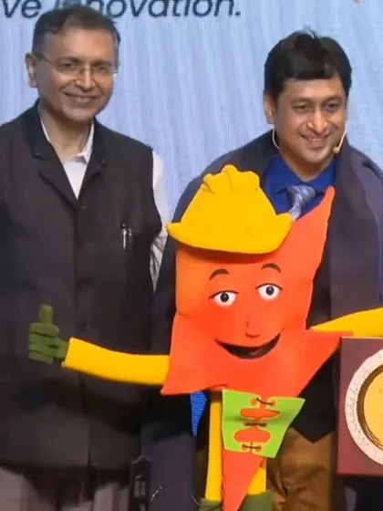 Receiving an award with the Suraksha Shakti puppet. Using puppetry for public service announcements is an effective way to capture attention and deliver an important message.