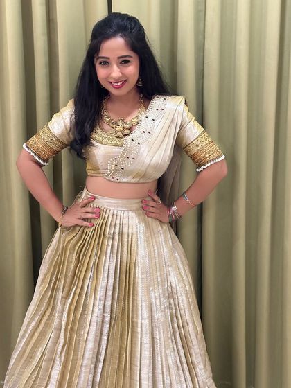 A happy and confident pose from singer Ananya Prakash. This cream and gold half saree is one of my all-time favourites.