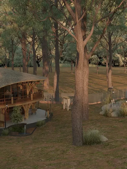 From this angle, the relationship between the main building and the surrounding forest is clear. The structure's curved roofline and wooden supports echo the forms of the trees, making it feel as if it grew from the earth itself.