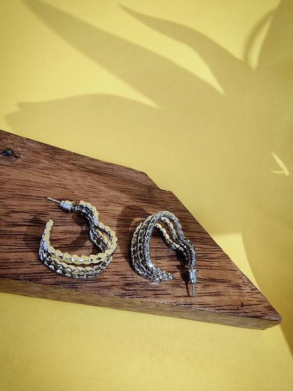 These non-tarnish silver heart-shaped earrings have a unique textured finish, perfect for a modern romantic look.