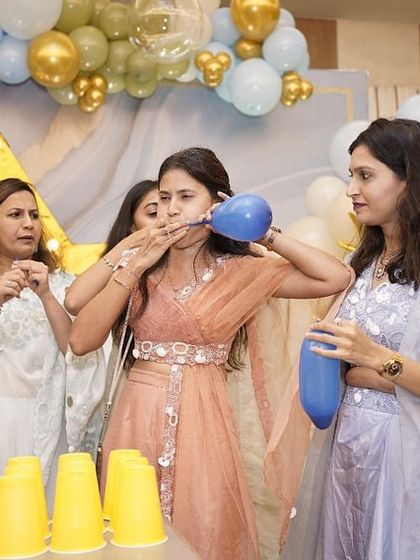A balloon-blowing game that brought out lots of laughs. The simple, playful activities are often the most memorable.