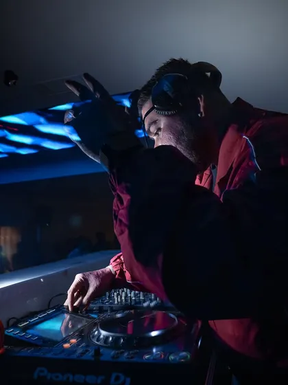 A close-up shot of me working the controls during my 10-year anniversary set. The gear is an extension of my creativity.